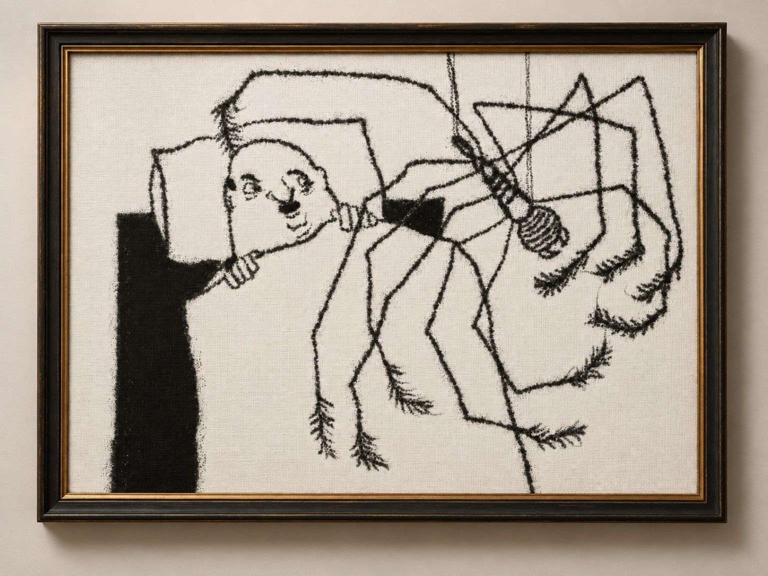 A framed charcoal drawing of a man peering over a bedsheet beside a hanging light bulb and tangled, spiderlike lines.