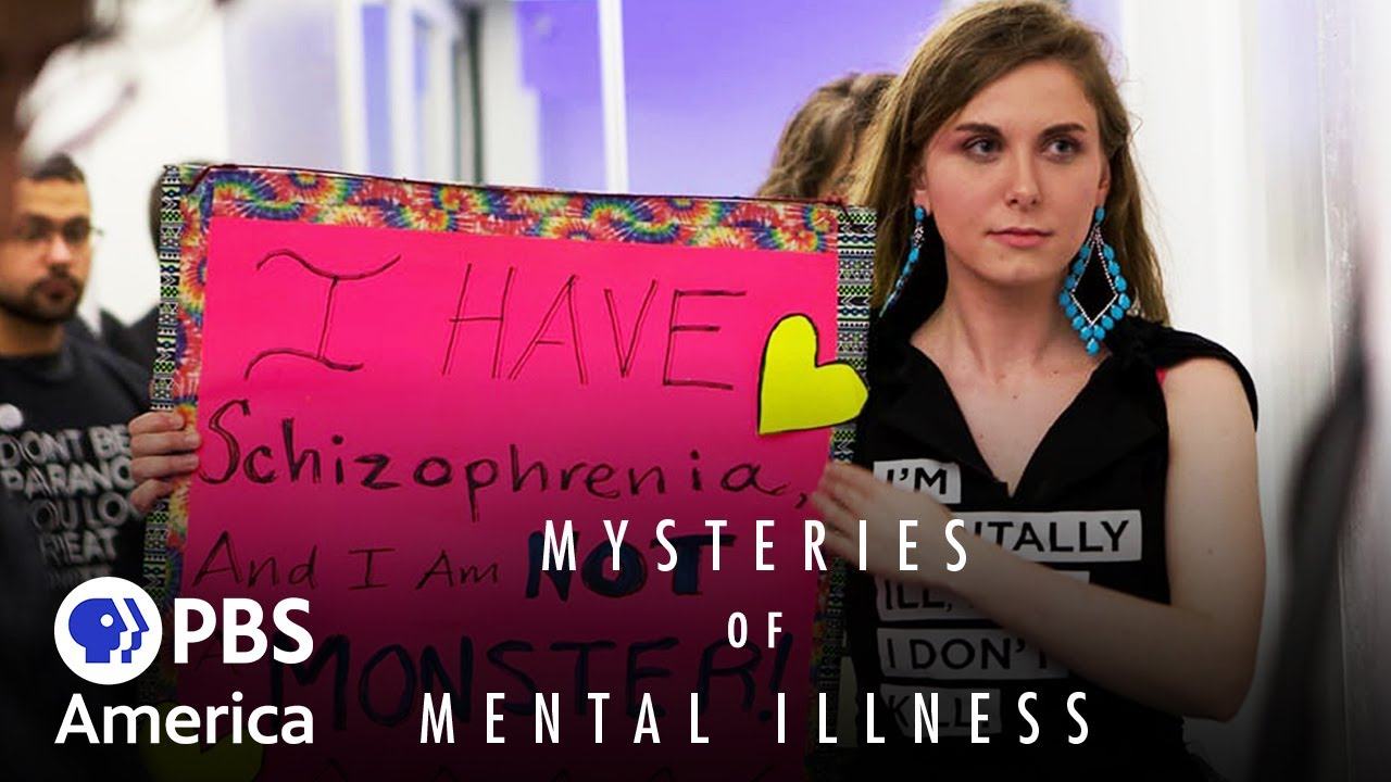 Mental-health activist Cecilia McGough holds a sign saying she has schizophrenia and is not a monster